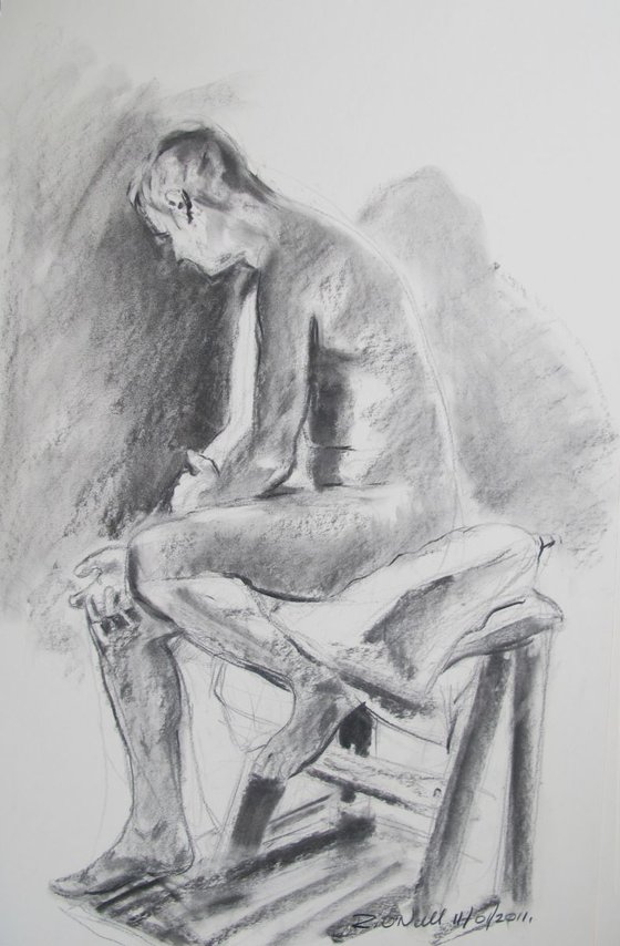 seated male nude