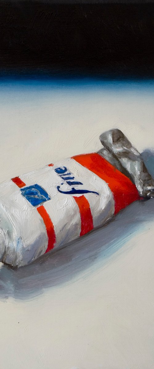 modern still life of a red color painting tube by Olivier Payeur