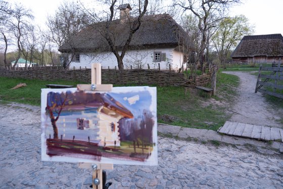 Old Ukrainian hut. Evening