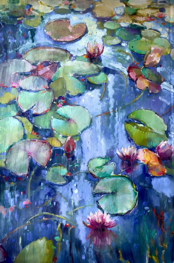 Water lilies on blue water