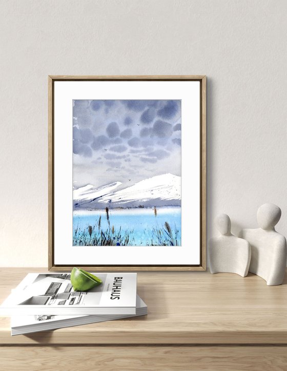 BLUE LAKE IN THE MOUNTAINS