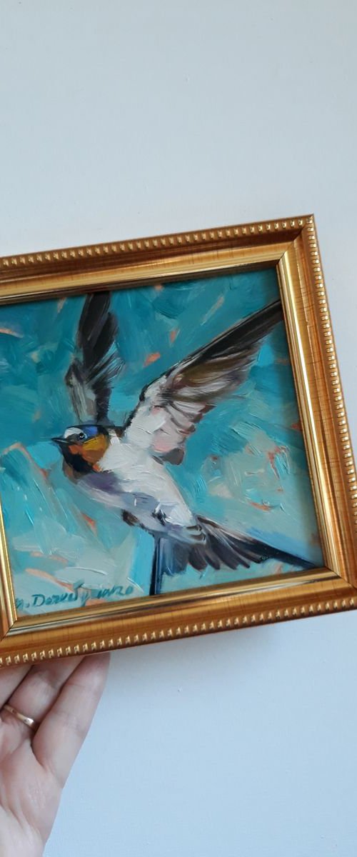 Swallow in flight by Nataly Derevyanko
