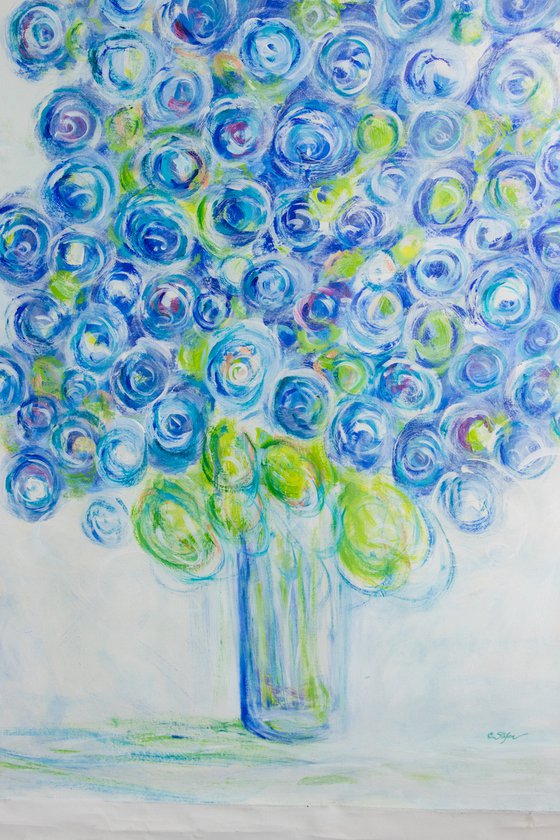 Vase with blue flowers