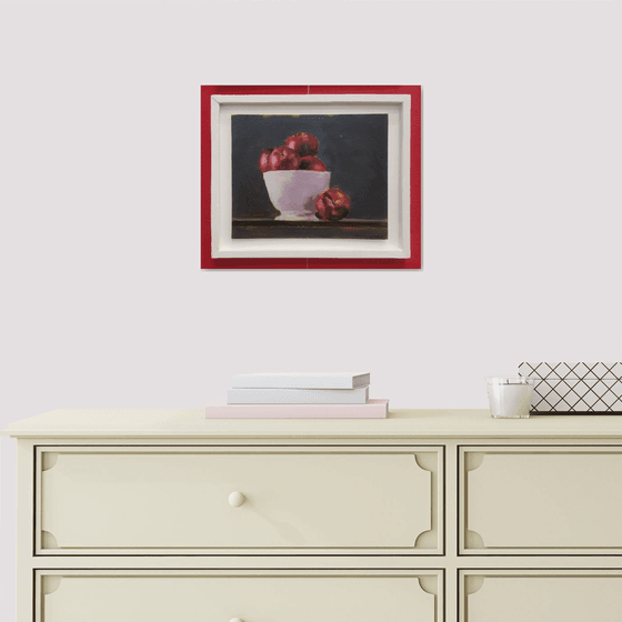 Apples in white bowl