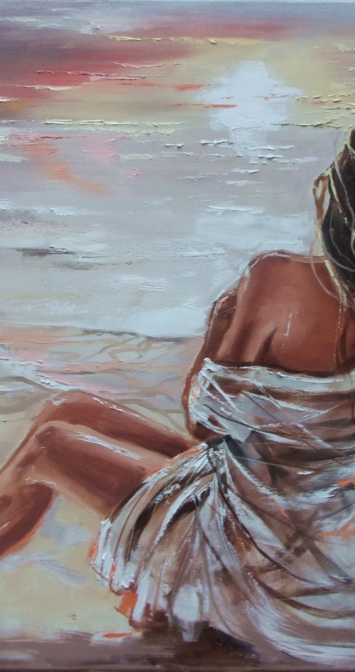 " BEACH WITH SUNSET GIRL SITTING " by Monika Luniak
