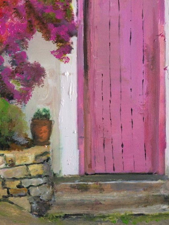 Mediterranean House with Pink Flowers