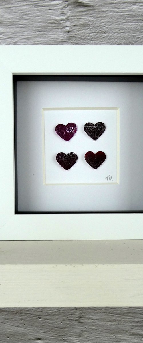 4 purple hearts by Tracey Mason