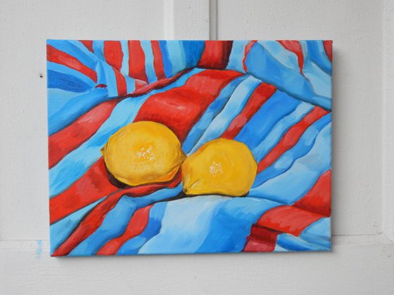 Lemons on the tablecloth. Still life. 30x40cm