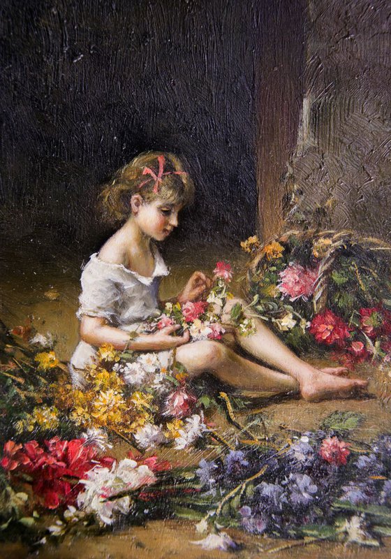 Portrait little girl into flowers