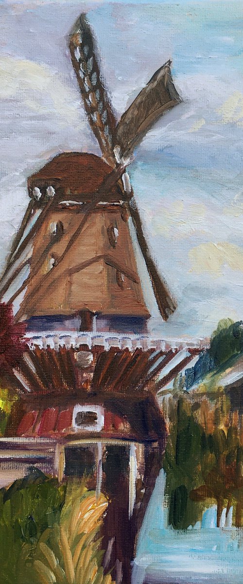 Windmill at the channel by Elena Sokolova