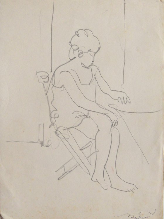 WOMAN SITTING on the CHAIR