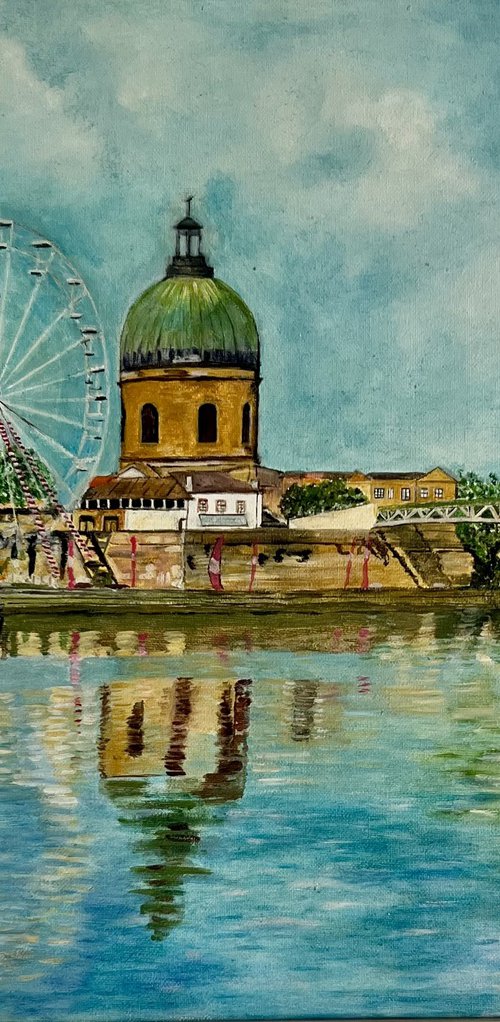 City with big wheel by Isabelle Lucas