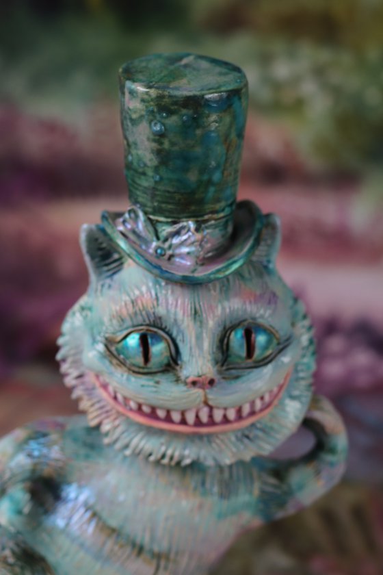 From the Alice in Wonderland. Cheshire Cat.  Clay sculpture.