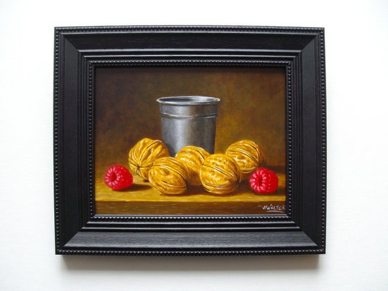 Nuts with a pewter cup