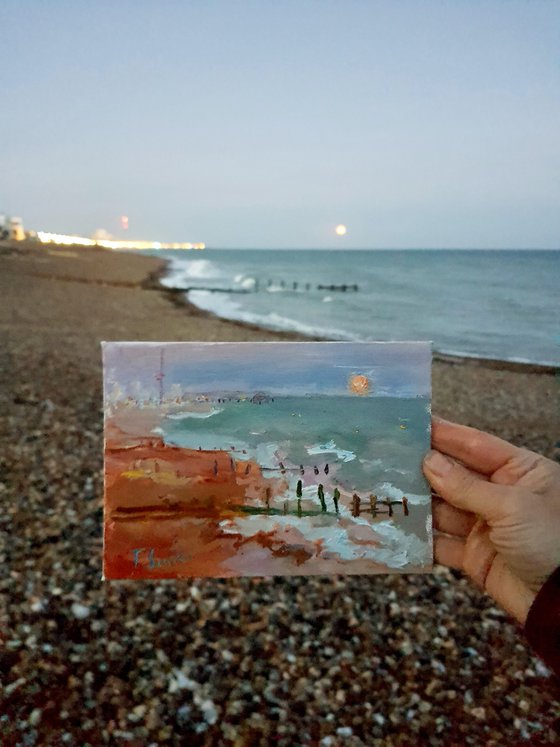 Full moon on the beach. UK
