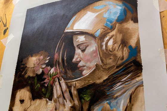 Woman in astronaut helmet