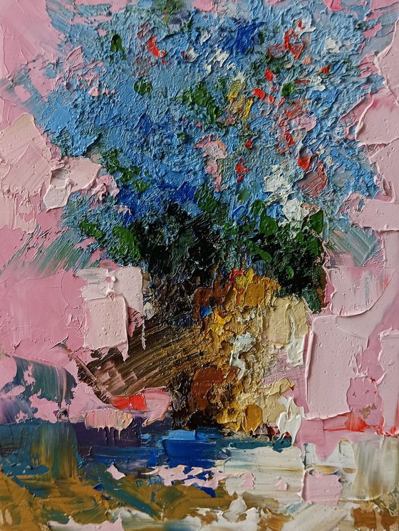 Blue flowers in the vase