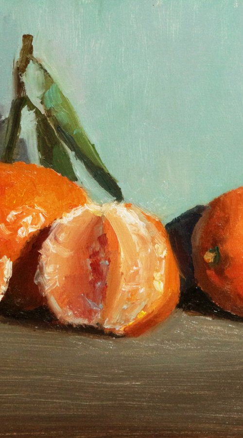 2 Clementines and half. by Pascal Giroud