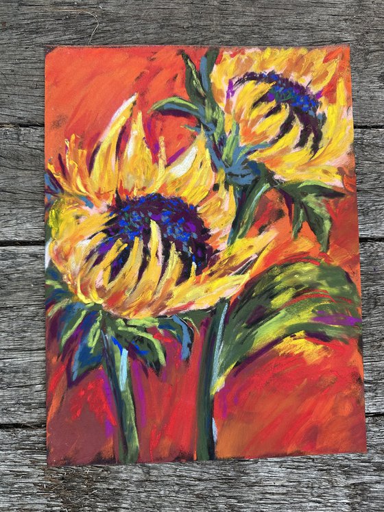 Sunflowers on a red background