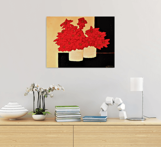 Pots Of Red Gerberas ON A BLACK TABLE