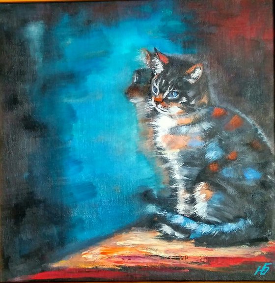 The cat at the mirror