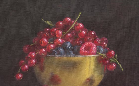 Berries in a golden bowl