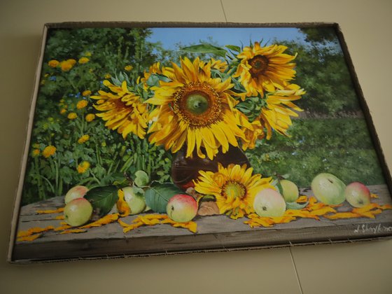 A bouquet of sunflowers in the Ukrainian ceramic jug