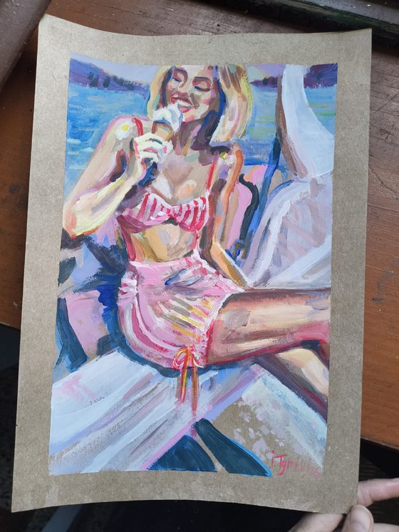 Girl with ice cream in Pink Swimsuit Beach