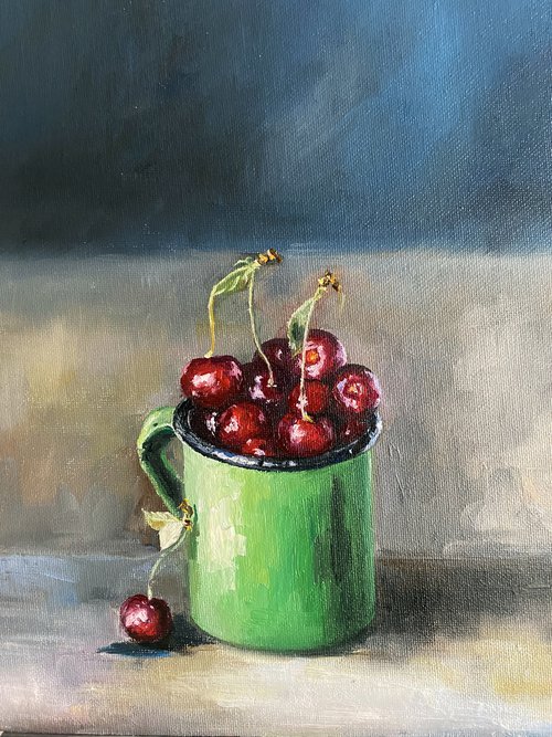 Cherries in a green cup by Elvira Sultanova