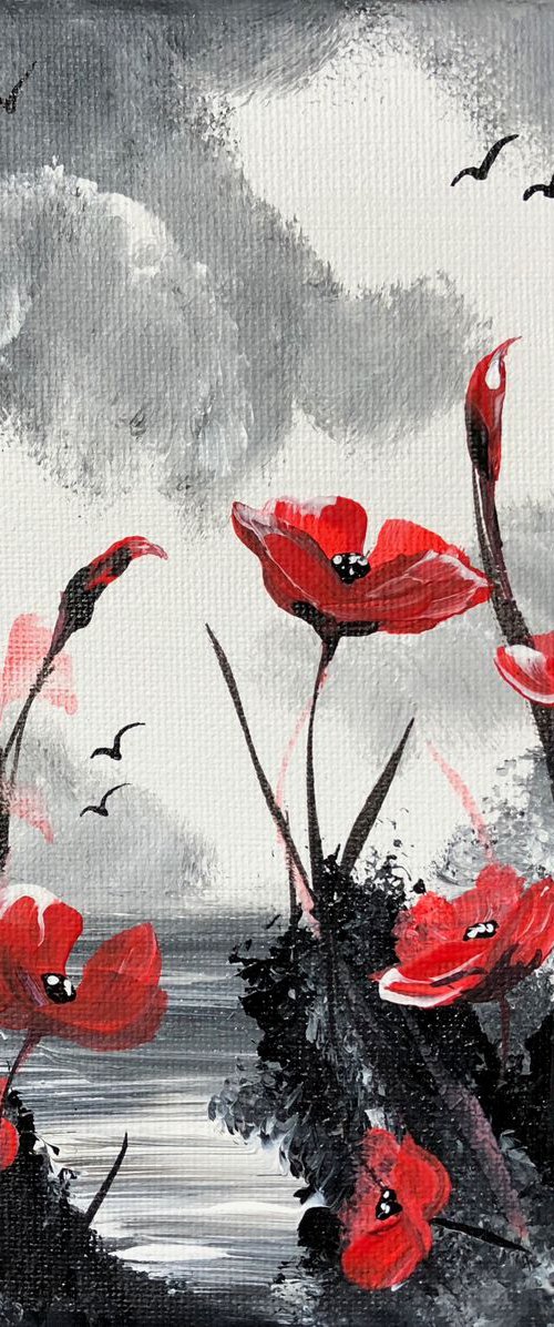 Red Poppies in a black frame by Marja Brown