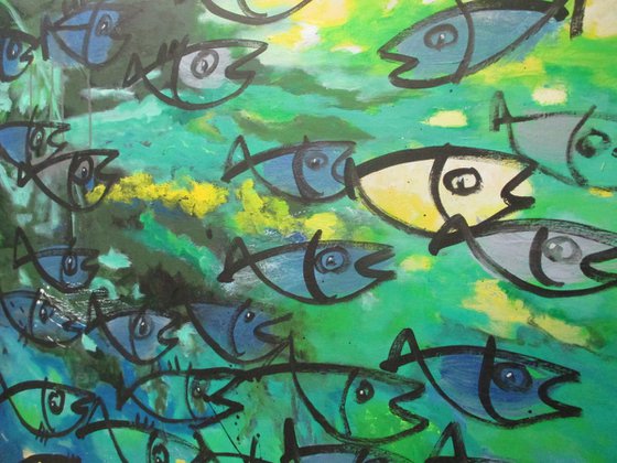 blue fishes jumping