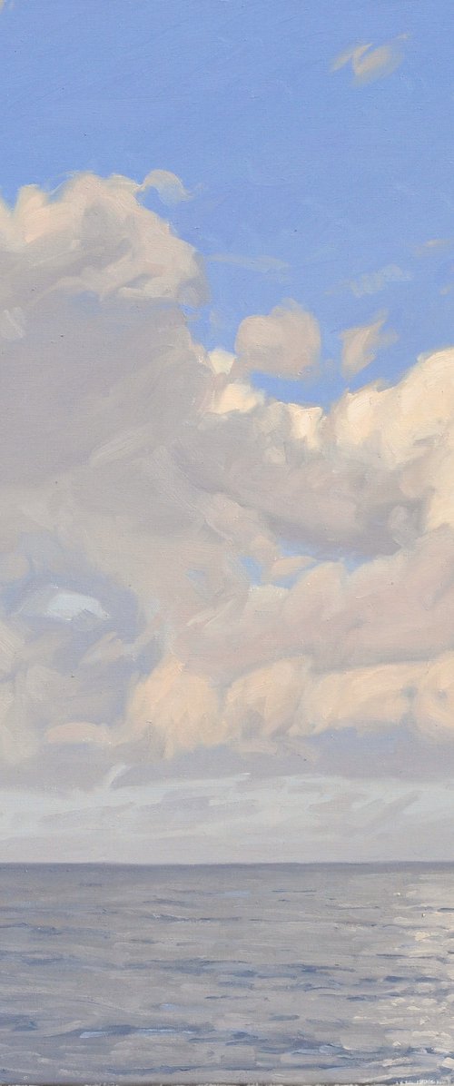 Clouds over the sea, morning sun by ANNE BAUDEQUIN
