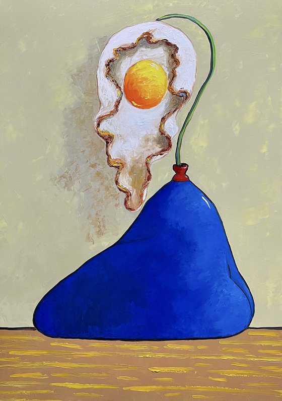 Egg flower in blue vase