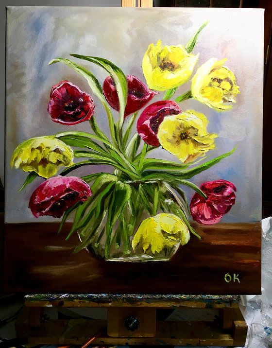 Bouquet of Red and Yellow tulips on wooden  table, still life. .