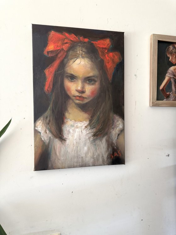 Girl with a red bow. Before.