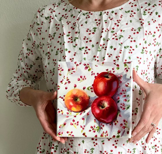 Apples on a floral background