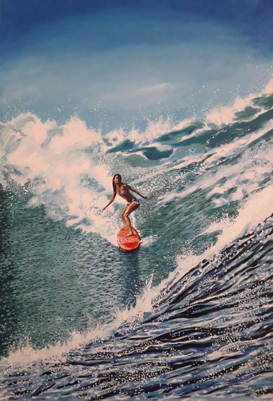 Surfer girl on blue waves