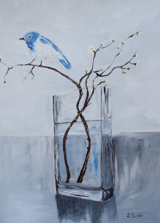 Vase with blue bird