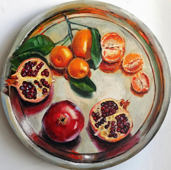 Pomegranates and tangerines