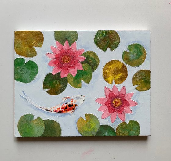 Koi fish and water lilies