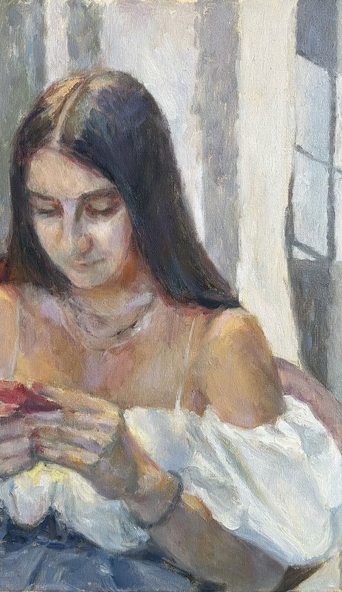 A girl reading a letter by Liudmyla Chemodanova