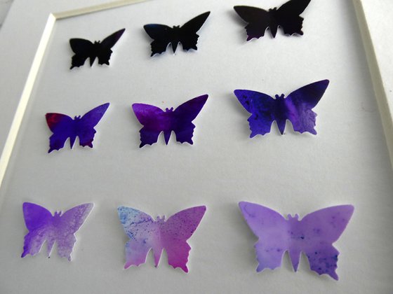 9 Purple butterflies