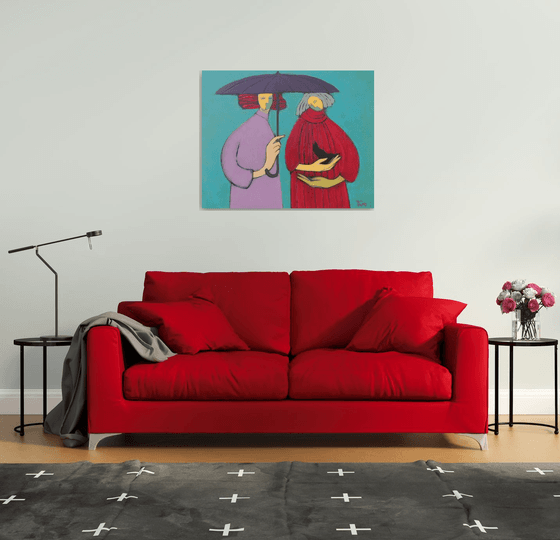 Two under an umbrella.