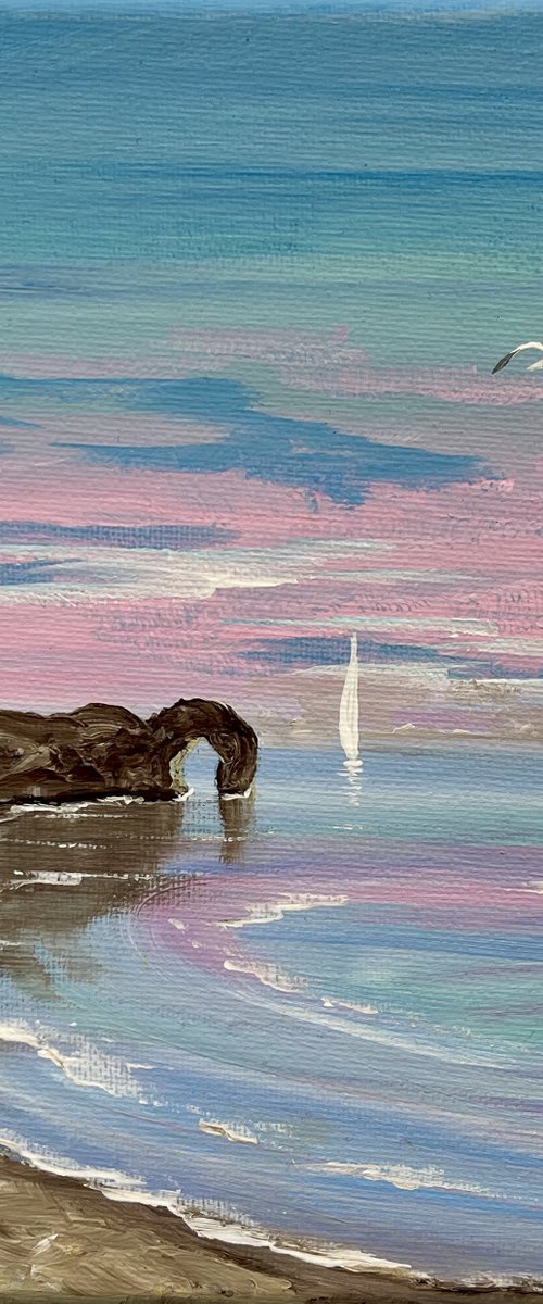 Durdle Door Under a Pink Sky by Marja Brown