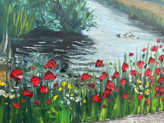 Red poppies by the water. Pleinair painting