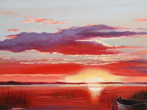 Sunset on the lake with boats landscape