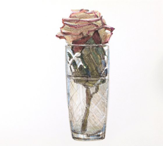 Rose in a faceted glass