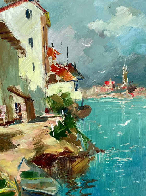 Two Boats at a Coastal House