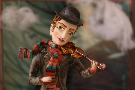 The Fiddler. Ceramic sculpture