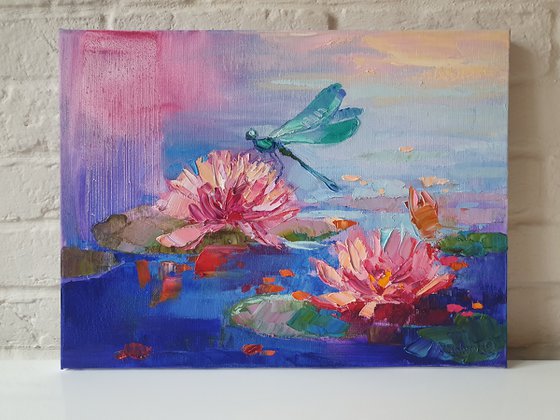 Lilies and dragonfly